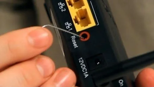 how to reset zyxel router